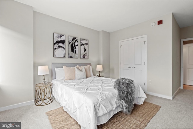 475 K St NW Unit 817, Washington, DC 20001 - carpeted bedroom featuring baseboards and a closet