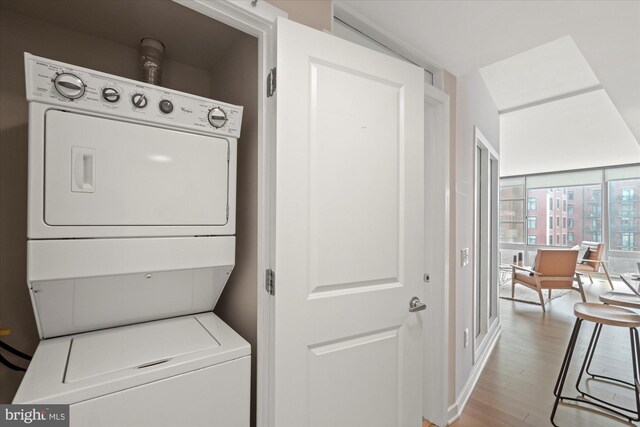 475 K St NW Unit 817, Washington, DC 20001 - laundry area with laundry area, stacked washer / dryer, and light wood finished floors