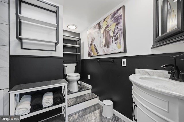 39 Riverview Ave, West Deptford, NJ 08086 - bathroom featuring toilet, vanity, and baseboards