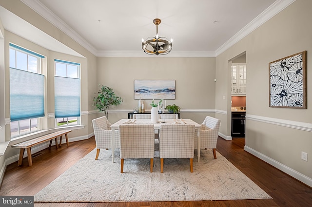 6354 Islington St, Middle River, MD 21220 - dining room featuring a chandelier, wood finished floors, crown molding, and baseboards