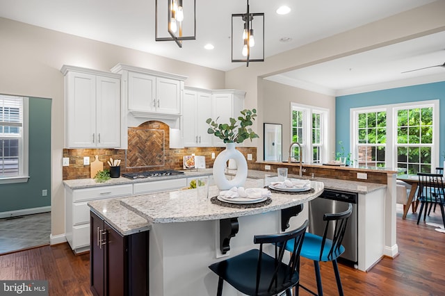 6354 Islington St, Middle River, MD 21220 - kitchen featuring appliances with stainless steel finishes, white cabinetry, tasteful backsplash, dark wood-type flooring, and recessed lighting