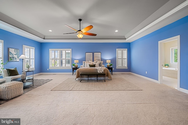 6354 Islington St, Middle River, MD 21220 - carpeted bedroom with a raised ceiling, ornamental molding, baseboards, connected bathroom, and ceiling fan
