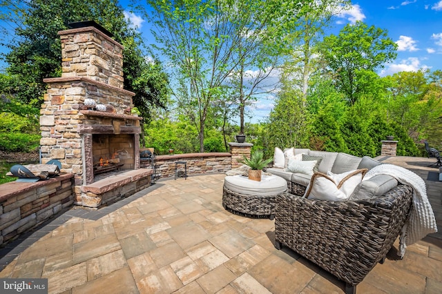 6354 Islington St, Middle River, MD 21220 - view of patio with an outdoor living space with a fireplace