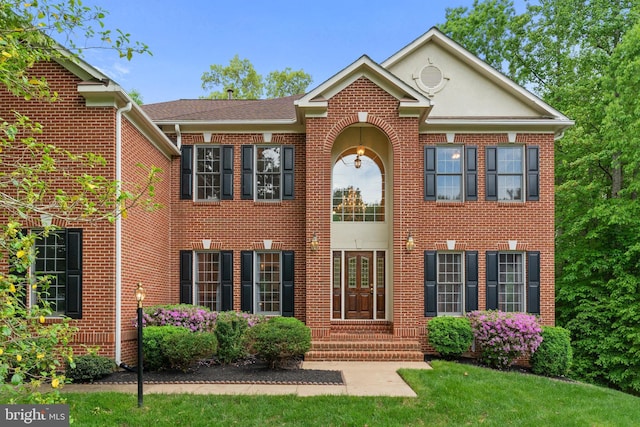 12850 Salmon Run Ct, Manassas, VA 20112 - georgian-style home with brick siding