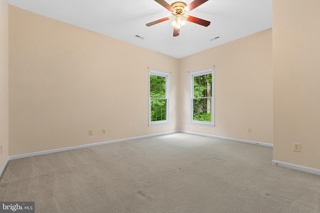 12850 Salmon Run Ct, Manassas, VA 20112 - unfurnished room with light colored carpet, visible vents, and baseboards