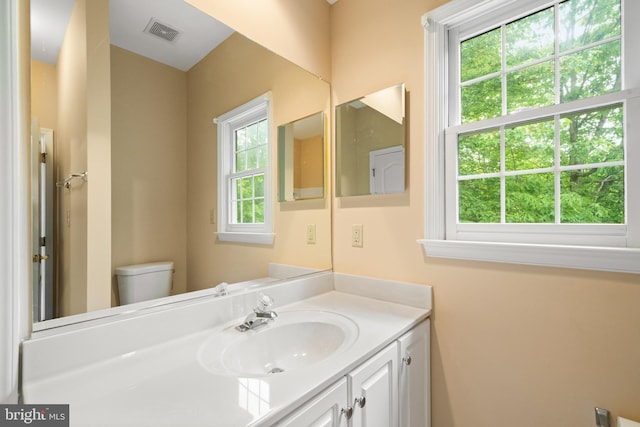 12850 Salmon Run Ct, Manassas, VA 20112 - half bathroom with toilet, vanity, and visible vents