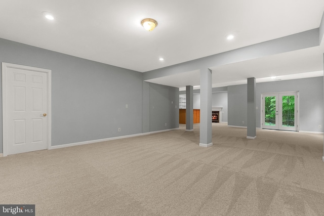 12850 Salmon Run Ct, Manassas, VA 20112 - below grade area with baseboards, a warm lit fireplace, recessed lighting, and carpet floors