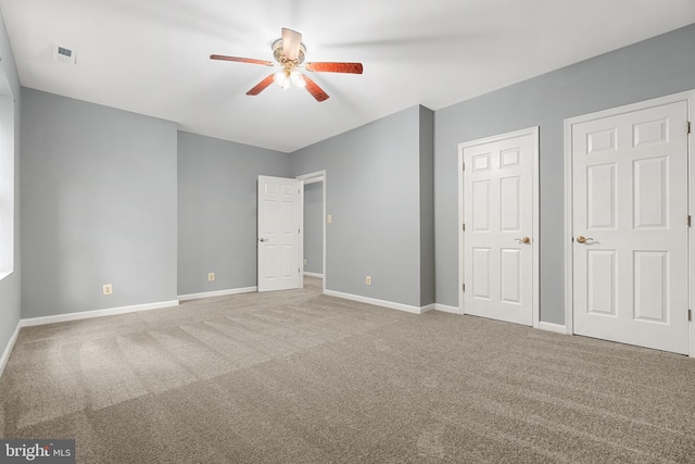 12850 Salmon Run Ct, Manassas, VA 20112 - unfurnished bedroom featuring baseboards, carpet flooring, and visible vents