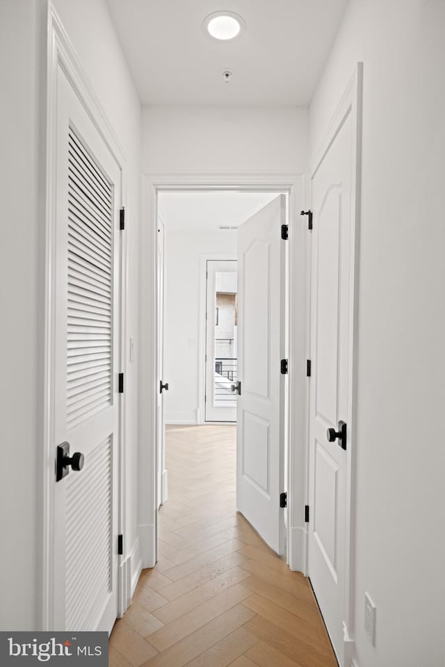 corridor featuring light wood-type flooring