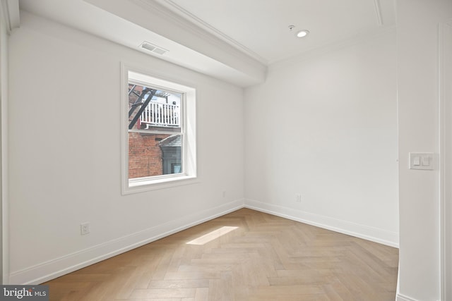 empty room featuring crown molding, baseboards, recessed lighting, and visible vents