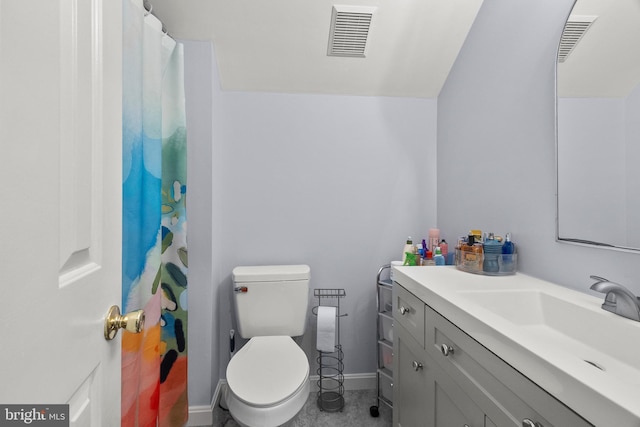 bathroom with visible vents, curtained shower, vanity, baseboards, and toilet