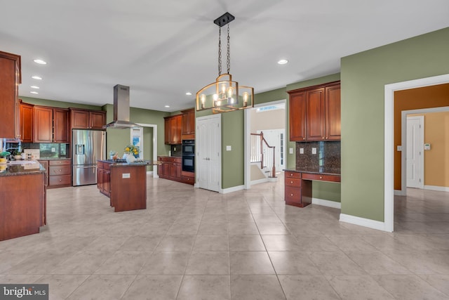 kitchen featuring decorative backsplash, a center island, a chandelier, stainless steel fridge with ice dispenser, and island exhaust hood