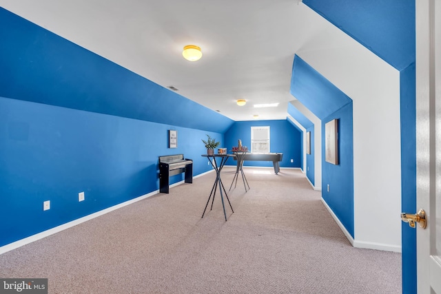 playroom featuring baseboards, carpet flooring, and lofted ceiling