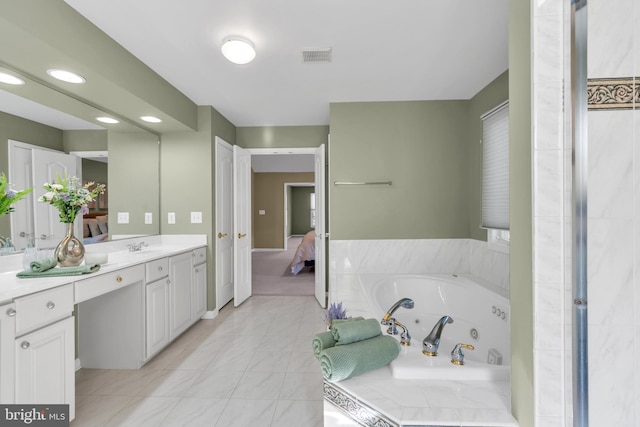 full bath featuring visible vents, a tub with jets, vanity, connected bathroom, and recessed lighting