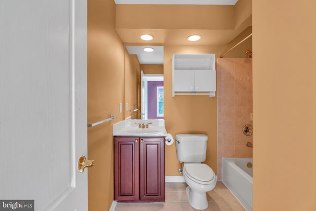 full bathroom featuring vanity, toilet, baseboards, bathtub / shower combination, and tile patterned floors