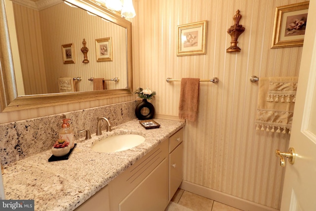 bathroom featuring tile patterned flooring and vanity