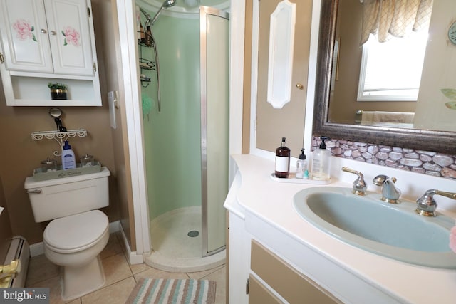 full bathroom with tile patterned flooring, a shower stall, vanity, a baseboard heating unit, and toilet