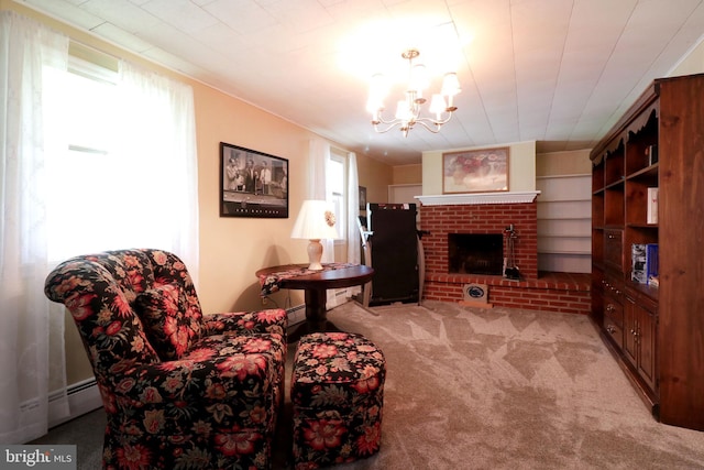 living area featuring carpet flooring, an inviting chandelier, and a fireplace