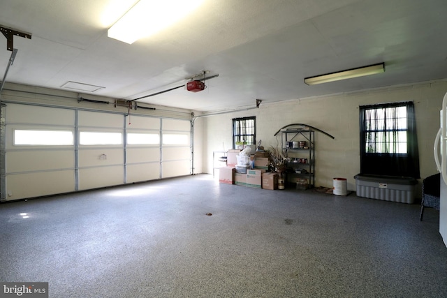 garage featuring a garage door opener