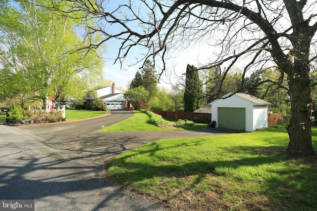 view of street with aphalt driveway
