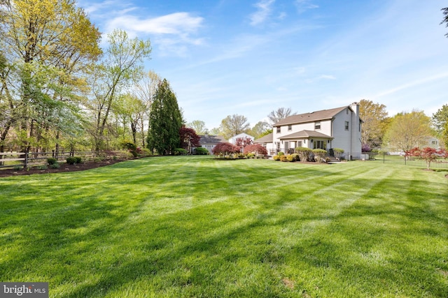 view of yard featuring a fenced backyard