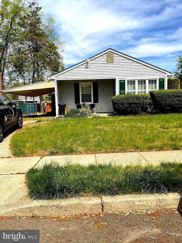 view of front of house featuring an attached carport