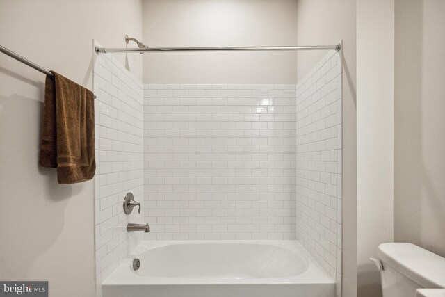 full bathroom with toilet and bathing tub / shower combination