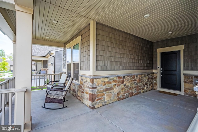 view of patio featuring a porch