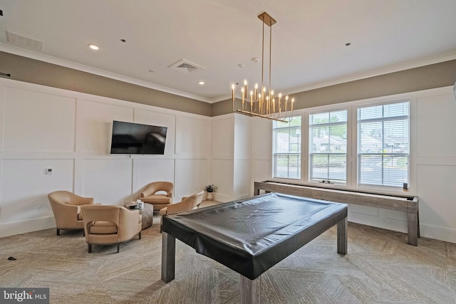 playroom with visible vents, ornamental molding, a decorative wall, a chandelier, and billiards