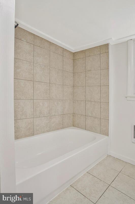 5018 Quimby Ave, Beltsville, MD 20705 - full bath featuring tile patterned flooring, a bathtub, and baseboards