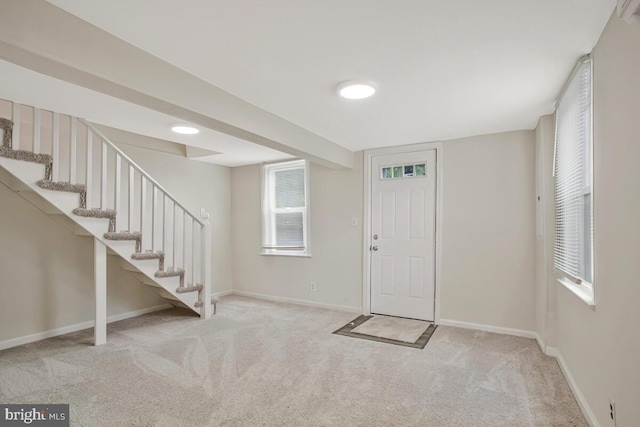 5018 Quimby Ave, Beltsville, MD 20705 - carpeted entrance foyer featuring stairway and baseboards