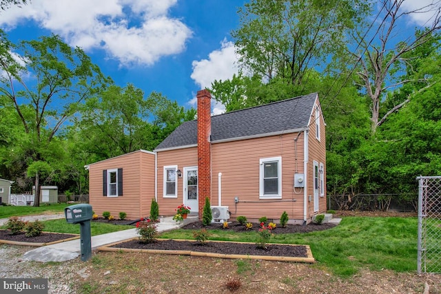 5018 Quimby Ave, Beltsville, MD 20705 - view of front facade with a chimney, a shingled roof, and ac unit