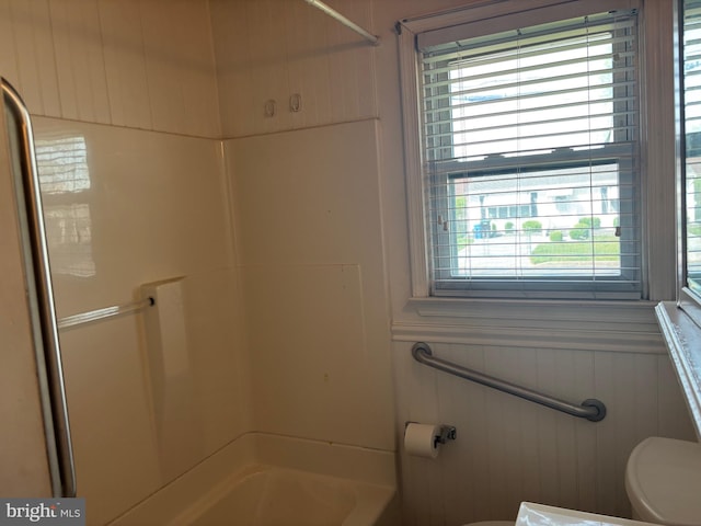 full bathroom with bathtub / shower combination and toilet