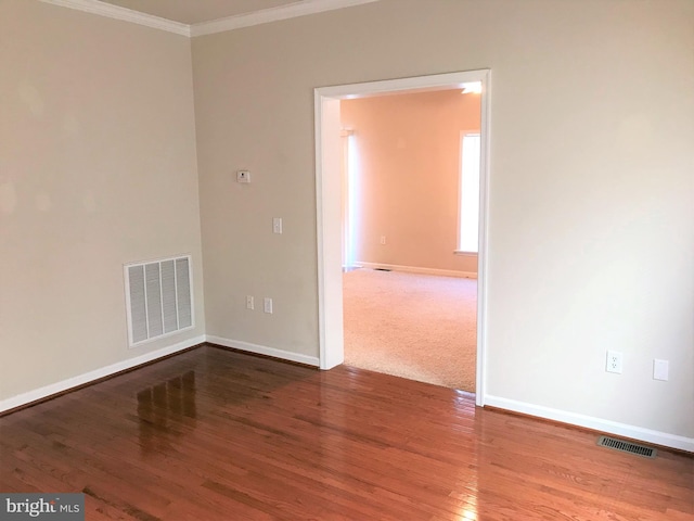3 Hot Springs Way, Stafford, VA 22554 - spare room with visible vents, baseboards, crown molding, and wood finished floors