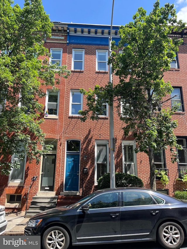 2122 E Lombard St E, Baltimore, MD 21231 - townhome / multi-family property featuring brick siding