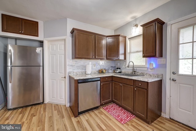 322-324 Washington Ave, Laurel Springs, NJ 08021 - kitchen featuring a sink, backsplash, stainless steel appliances, and light wood-style flooring