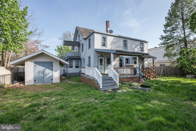 322-324 Washington Ave, Laurel Springs, NJ 08021 - rear view of house with fence, a storage shed, an outbuilding, a chimney, and a yard