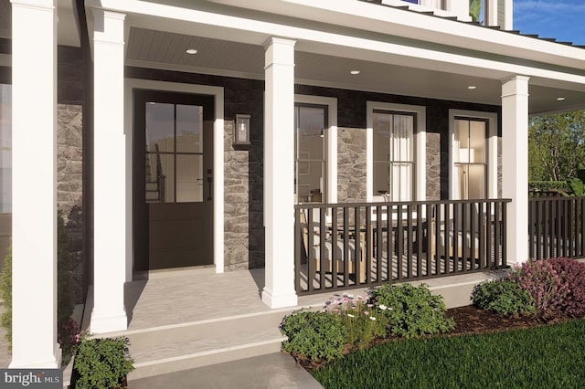 property entrance with covered porch and stone siding