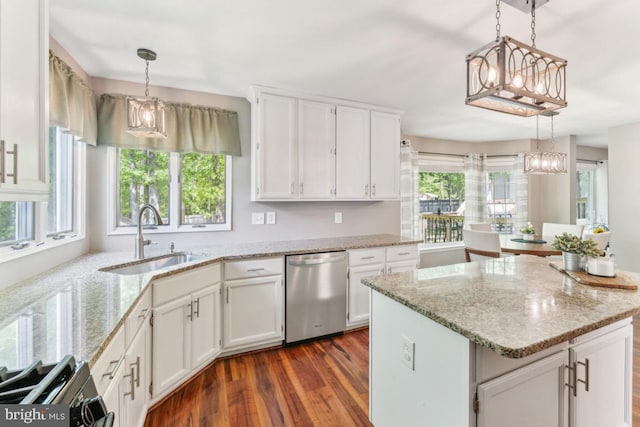13213 Windy Leaf Ct, Woodbridge, VA 22192 - kitchen with plenty of natural light, dark wood-style flooring, dishwasher, a sink, and an inviting chandelier