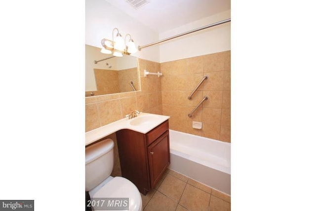8710 Manchester Rd Unit 1, Silver Spring, MD 20901 - full bath featuring washtub / shower combination, tile patterned flooring, vanity, toilet, and visible vents