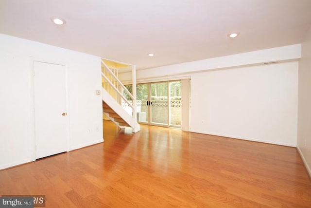 8710 Manchester Rd Unit 1, Silver Spring, MD 20901 - spare room with stairs, recessed lighting, baseboards, and wood finished floors