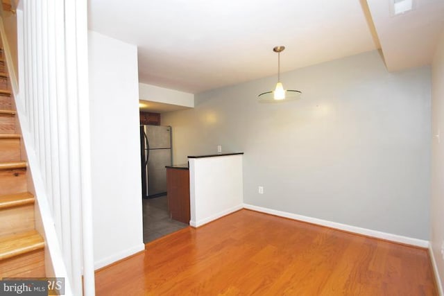 8710 Manchester Rd Unit 1, Silver Spring, MD 20901 - interior space featuring light wood-style floors, baseboards, and stairs