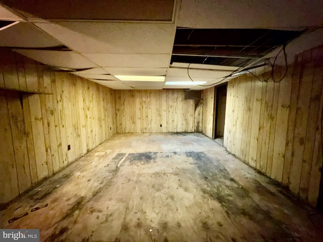 unfinished basement with wooden walls