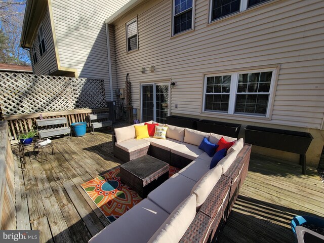 deck with outdoor lounge area