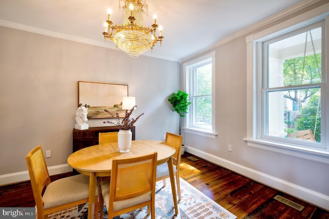 209 11th St NE, Washington, DC 20002 - dining area with a chandelier, baseboards, healthy amount of natural light, wood finished floors, and crown molding