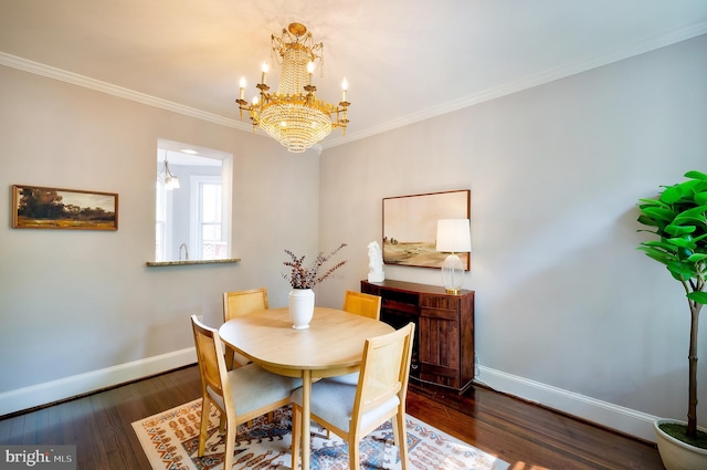 209 11th St NE, Washington, DC 20002 - dining room featuring a chandelier, baseboards, wood finished floors, and crown molding