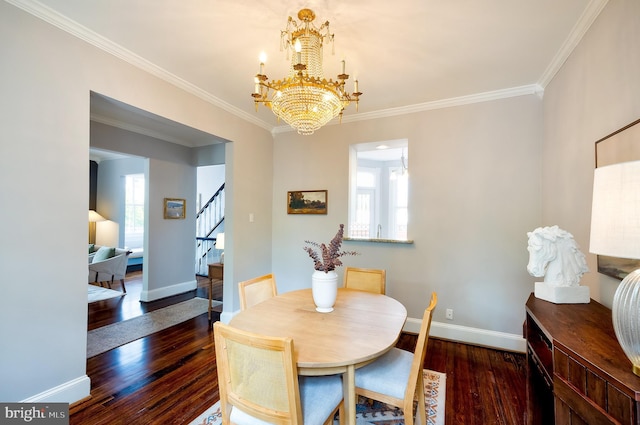 209 11th St NE, Washington, DC 20002 - dining room with stairway, hardwood / wood-style flooring, crown molding, baseboards, and a chandelier