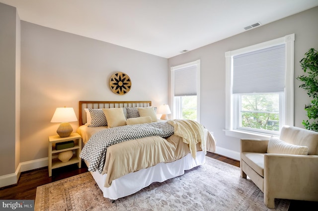 209 11th St NE, Washington, DC 20002 - bedroom featuring baseboards and wood finished floors