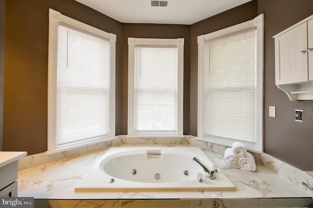 209 11th St NE, Washington, DC 20002 - full bath featuring a whirlpool tub and vanity
