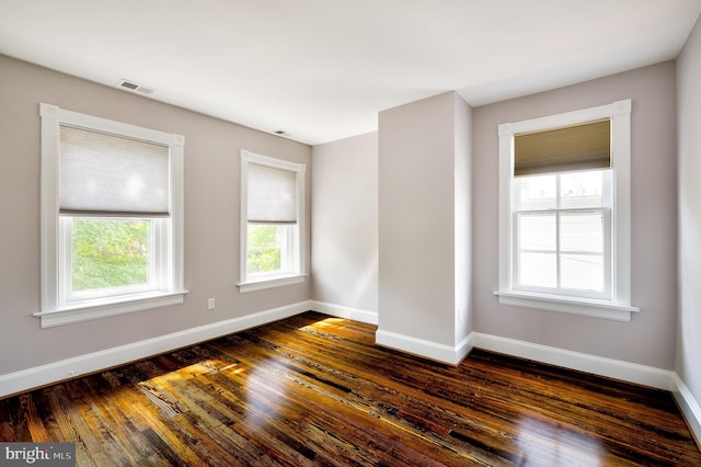 209 11th St NE, Washington, DC 20002 - unfurnished room with baseboards and dark wood finished floors